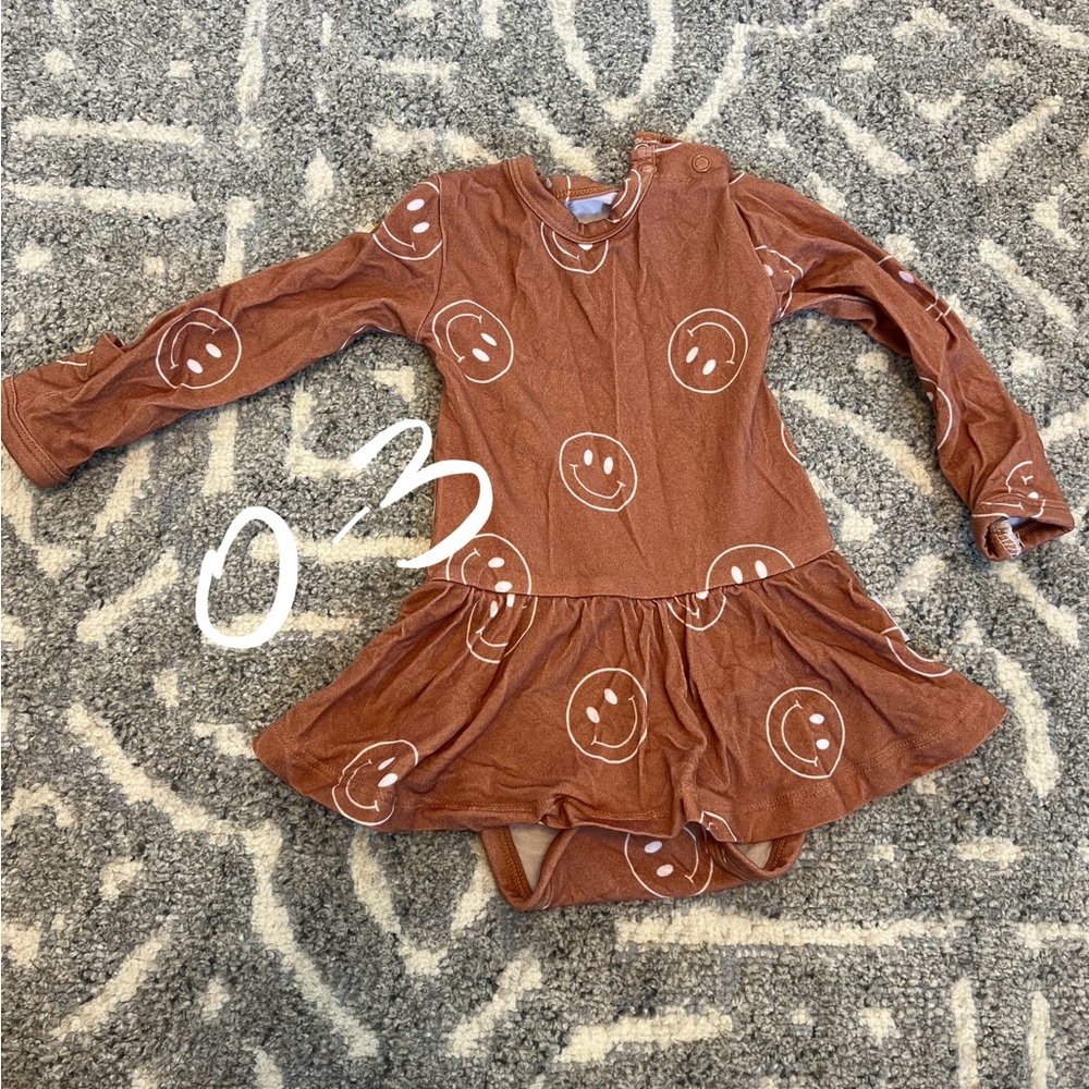 Blush Lotus Smile Skirted Onesie